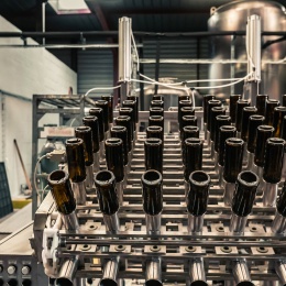 Bac à bouteilles, remplisseuse automatique